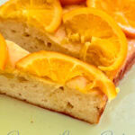 Fresh orange citrus cake topped with orange slices, easy homemade citrus dessert, moist lemon or orange cake recipe, simple citrus lover's cake from Simply Made Dish.
