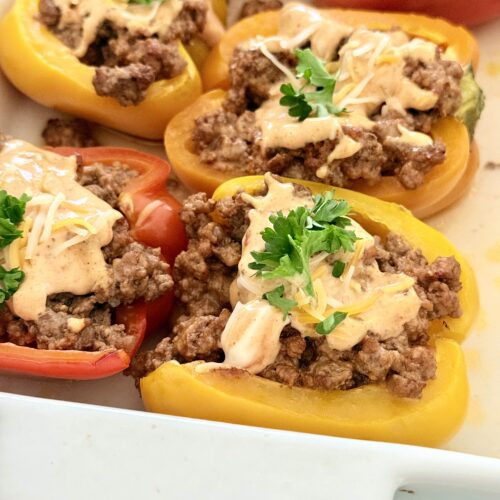 easy cheeseburger stuffed peppers in a tray on the counter