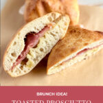 sliced toasted prosciutto sandwich on parchment paper