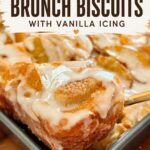 Close-up of freshly baked peach brunch biscuits drizzled with vanilla icing, showcasing their golden-brown, flaky texture and juicy peach pieces inside. The biscuits are served in a baking dish, highlighting their inviting appearance, ideal for a sweet breakfast or brunch treat.