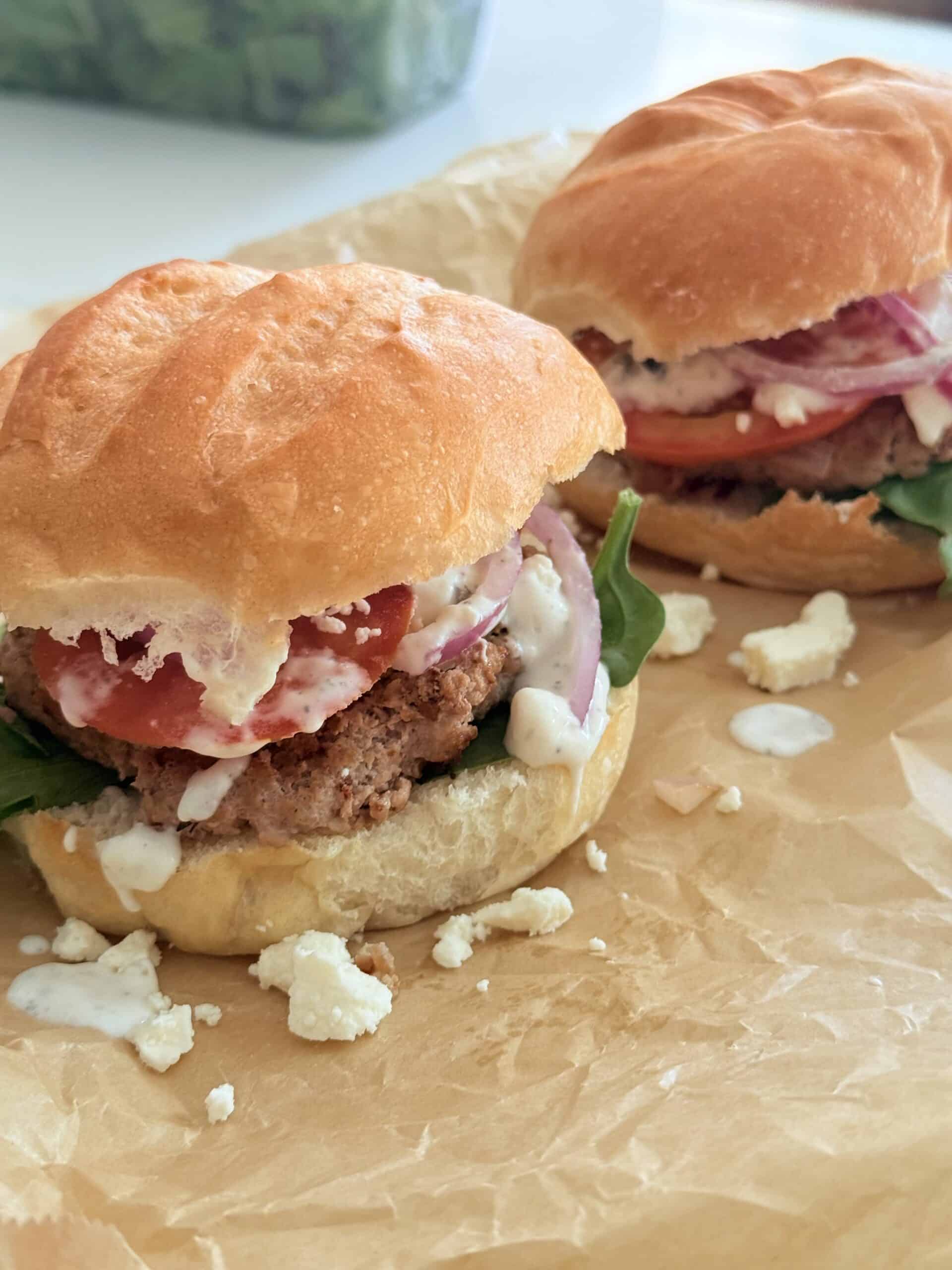 Greek turkey burgers on parchment paper
