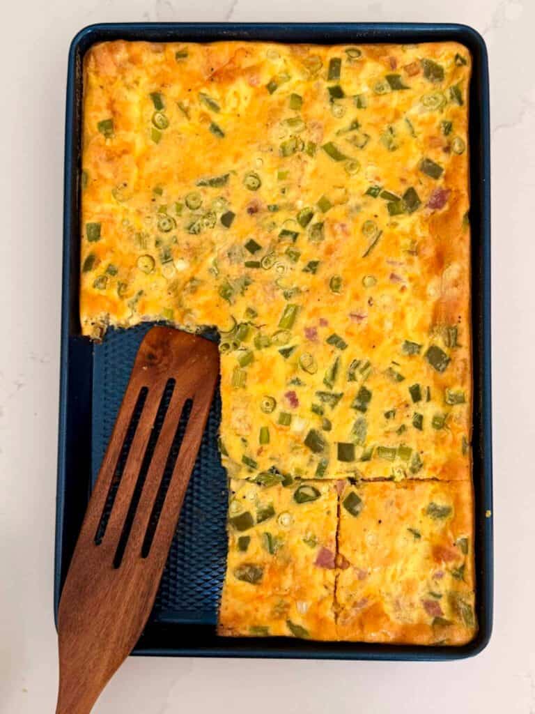 Denver omlette in a blue sheet pan on the counter