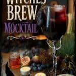 Witches Brew Mocktail served in a spooky glass with a skeleton stirrer, surrounded by candles, berries, and Halloween decorations for a festive look.