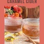 Sweet spiked caramel cider served in textured glass jars with candies and cinnamon sticks, perfect for fall chilly evenings. Featured on Simply Made Dish, a delicious homemade beverage recipe.