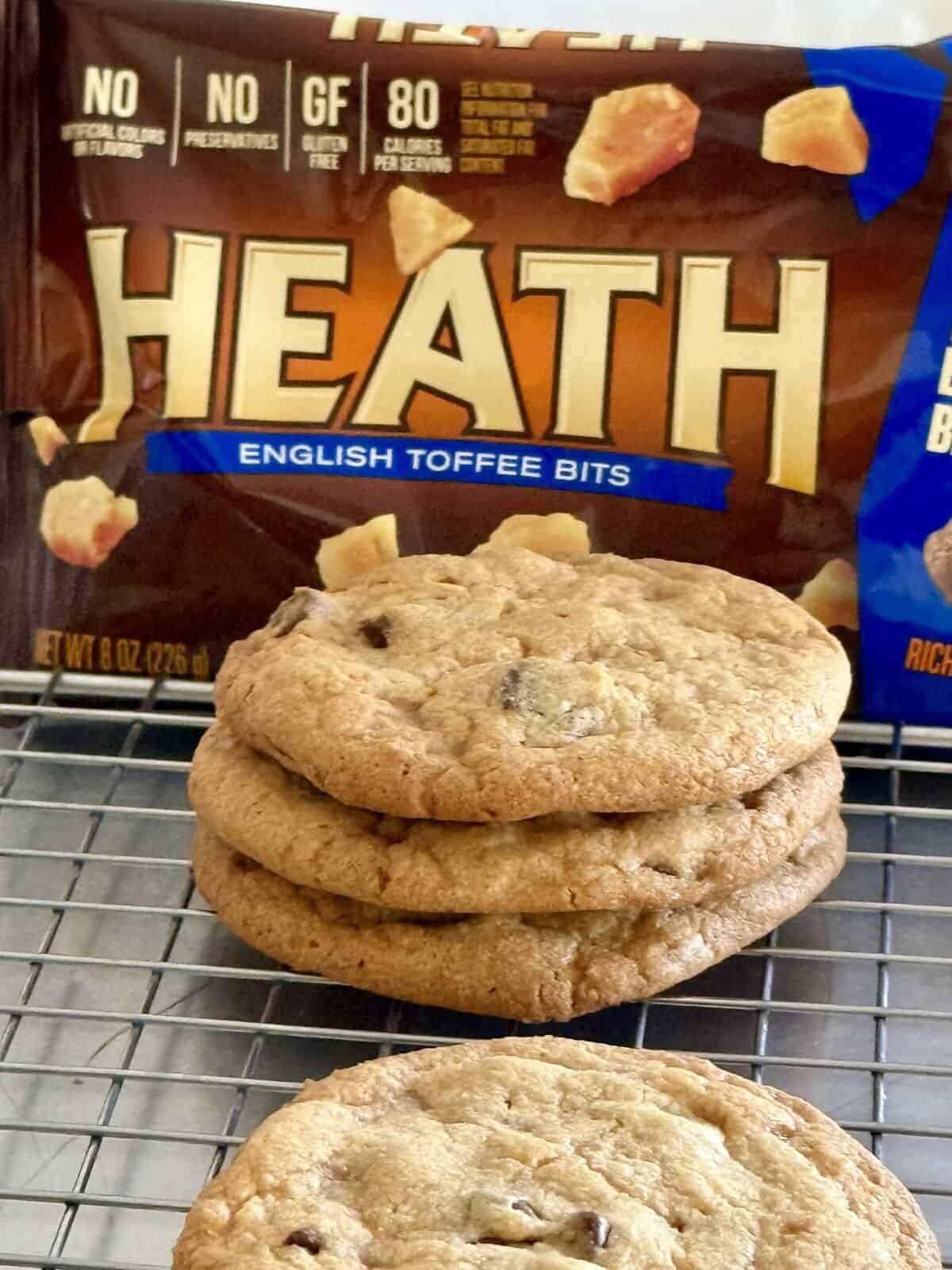 Crunchy English toffee bits on homemade chocolate chip cookies, featuring Heath toffee flavor, gluten-free, no artificial ingredients, perfect for snacking or dessert, beautifully displayed on a cooling rack.