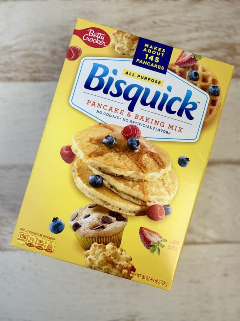 Box of Bisquick pancake and baking mix with pancakes, muffins, and berries on the front, ideal for quick and easy recipes.