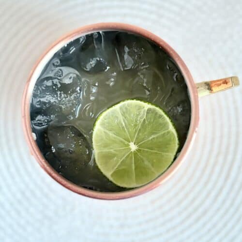 Moscow Mule garnished with lime served in a copper mug
